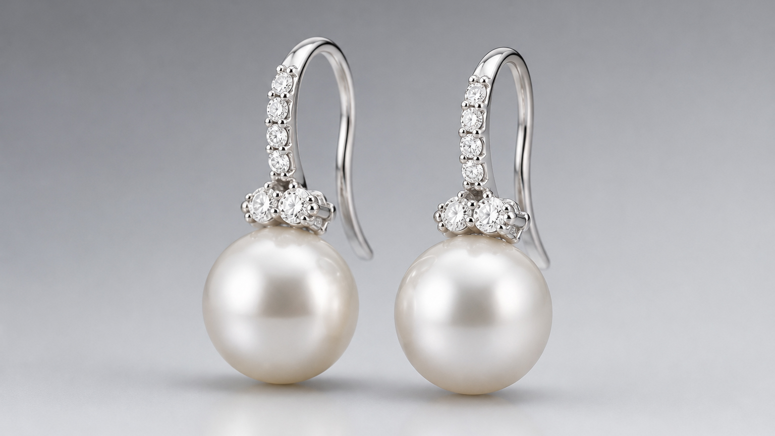 Pearl earrings photographed with premium e-commerce product photography standards - AI jewelry photography vs real